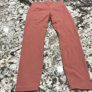 Lululemon Wunder train leggings, salmon colored, size 4, 25 inch high rise.